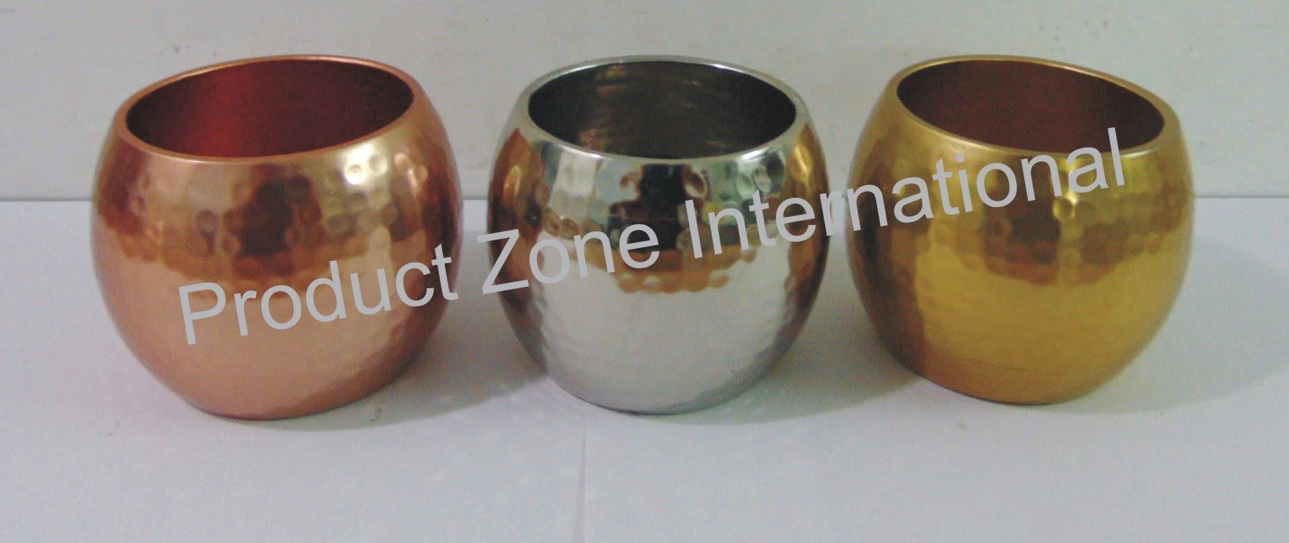 Hammered metal votives in copper, nickel and gold